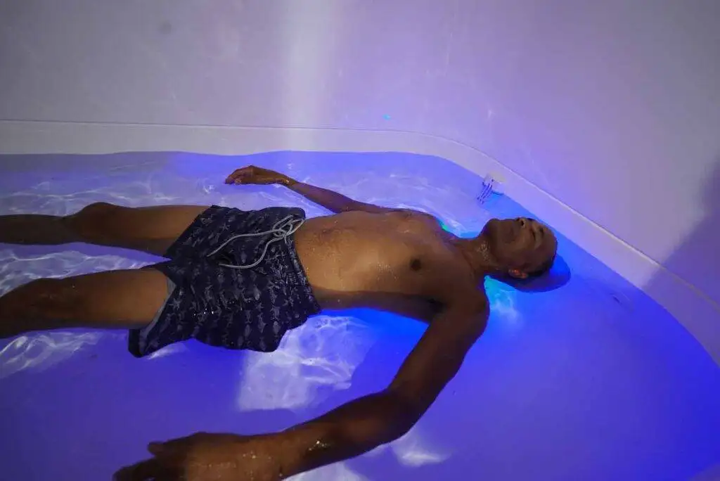 Man floating in a float tank