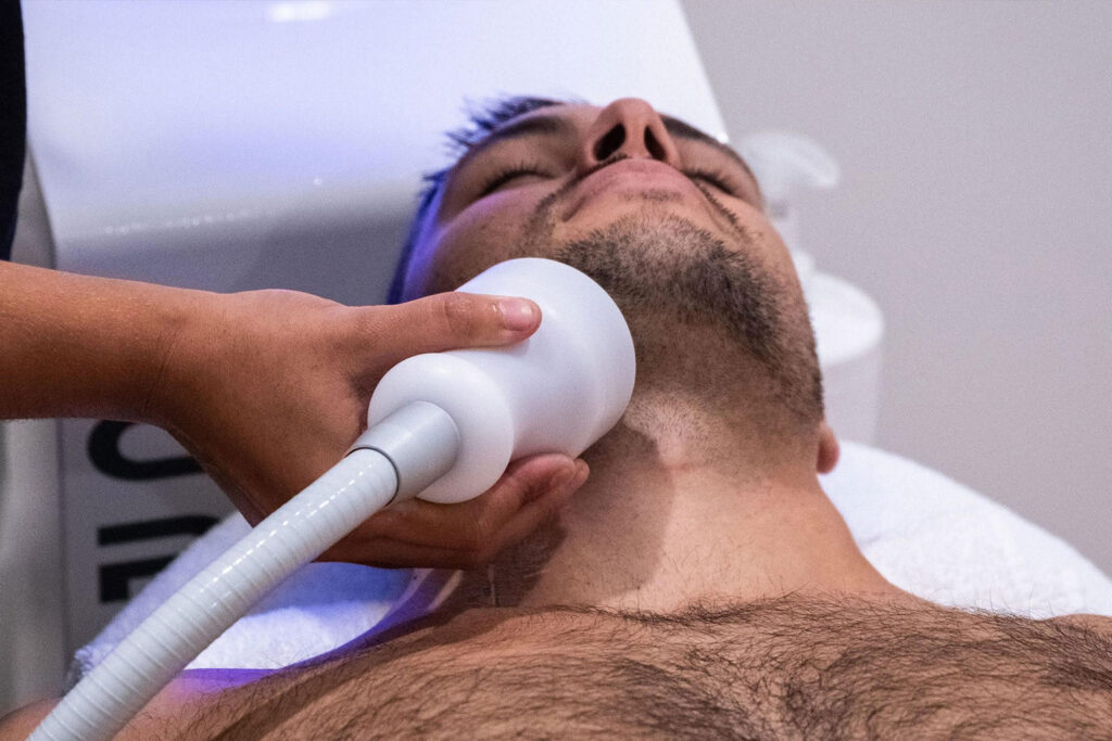 A man getting a cryofacial treatment.